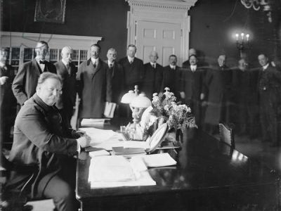 President William Howard Taft signs New Mexico into statehood at the White House, Jan. 6, 1912